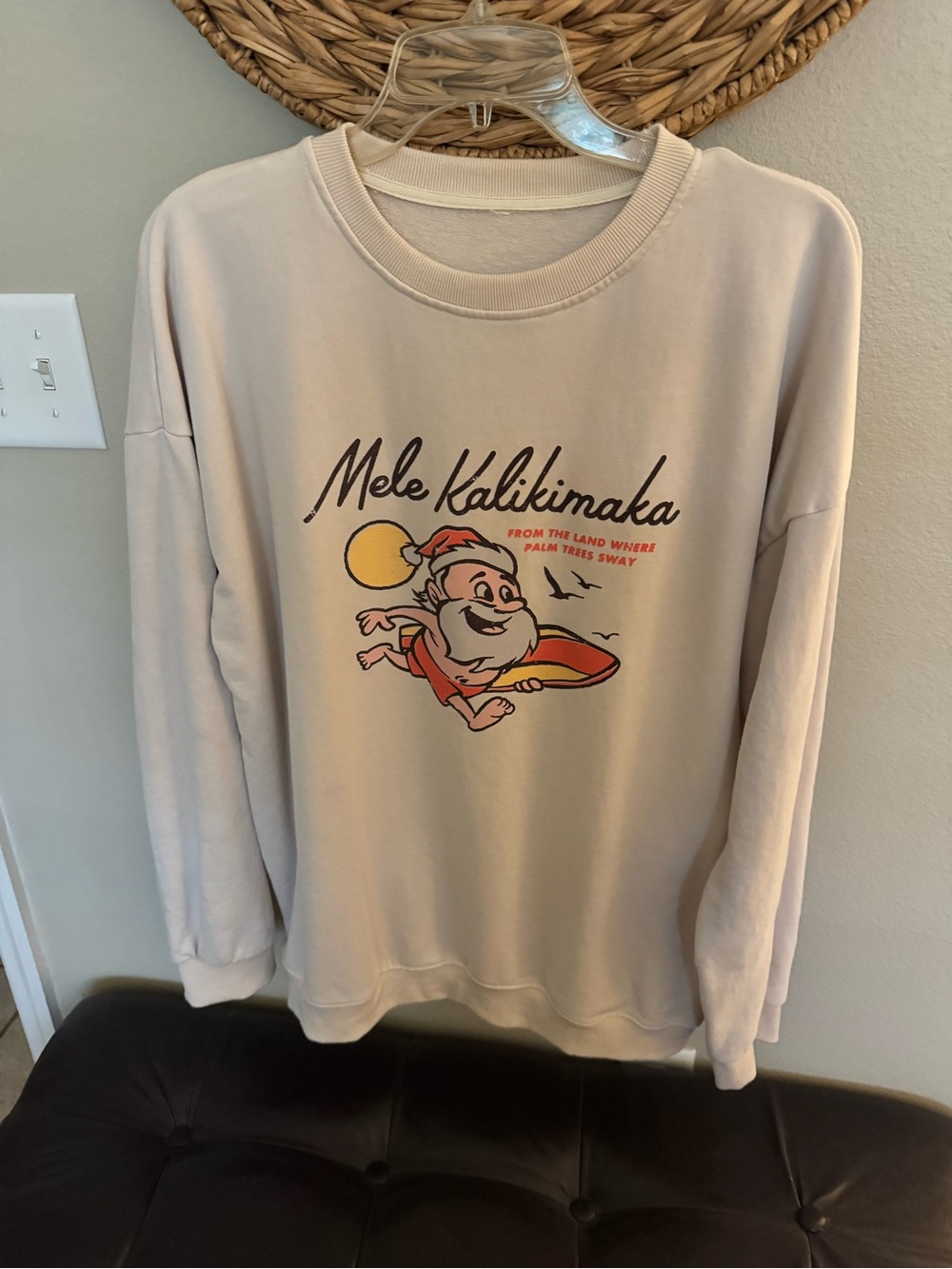 Women’s Cream Graphic Sweatshirt - Mele Kalikimaka Surf Santa